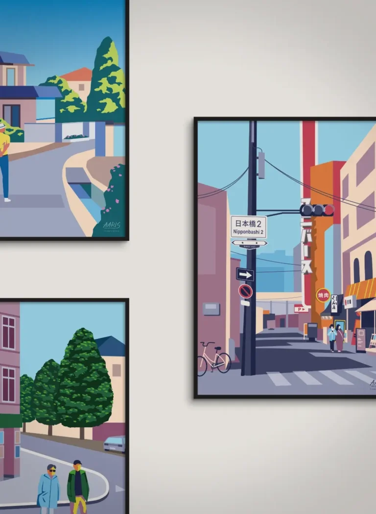 Tre kunstplakater fra Aaris Studio hænger på en væg.